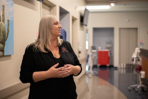 Chief Nursing Officer Annie Giagni talks to staff at Exceptional Community Hospital in Maricopa.
