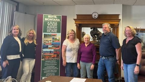 Butte Food Co-Op board members alongside Headwaters RC&D Executive Director Kelly Sullivan and USDA Business Programs Director Lad Barney. USDA photo.
