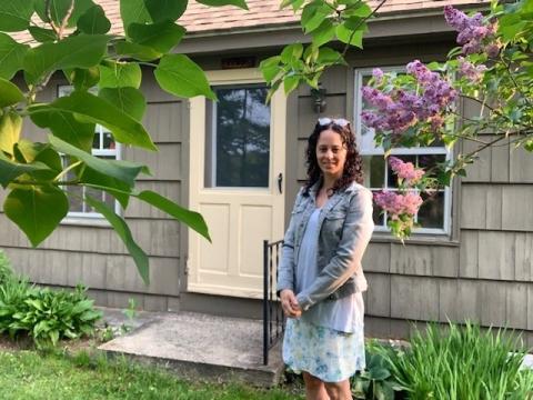 Stephanie Jacques Klein outside her front door