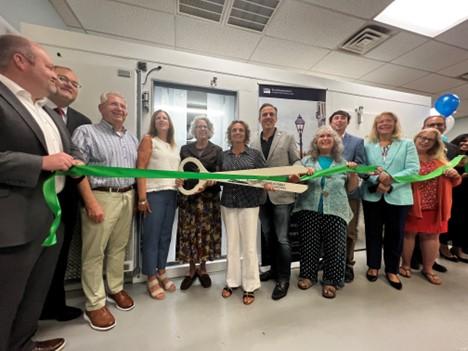 Image of people participating in a ribbon cutting ceremony with the USDA and Flemington Food Pantry in New Jersey