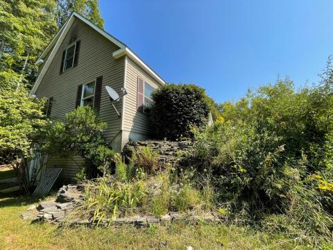 The side of Lisa Gallant’s home in South Paris, Maine.
