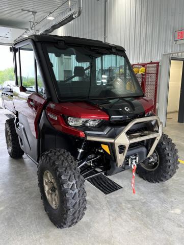 A red side-by-side all terrain vehicle is pictured inside the Corinna Fire Department. 