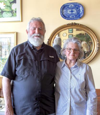 The Doyles in the dining room of their restaurant