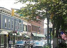 Downtown, rural America, with buildings and American flag