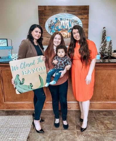 New homeowner Kaitly and son on closing day.