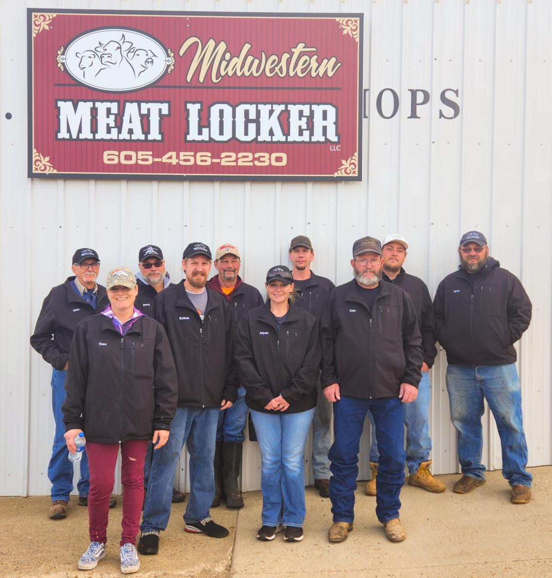 Staff gathered for a photo outside Midwestern Meat Locker in 2022. The Veteran-owned business has expanded over the years and currently employs Veterans from multiple branches of the military.
