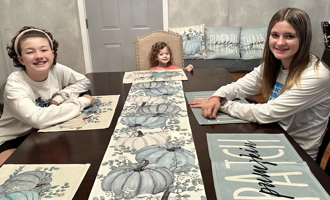 Kayla's three daughters at the table