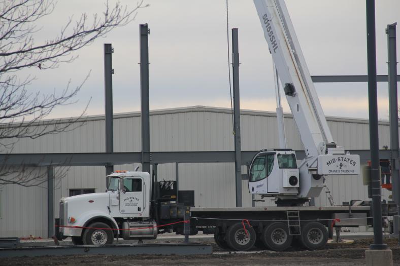 A semi-tractor in front of the industrial building site at Mid-States Material Handling and Fabrication in Nevada, Iowa