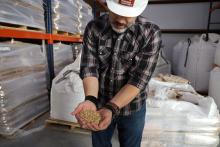 Matt Drew illustrates how controlled germination, which essentially tricks the grains into waking up, allows Montana Craft Malt to yield up to 10,000 metric tons of product annually from Montana-grown barley.