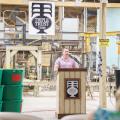 State Director Travis T. Burton speaks during the grand opening of a business in in Mt. Sterling, Kentucky.