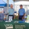 When agencies come together, we're able to serve our communities even better. USDA RD Idaho Director and NRCS Acting State Conservationist come together at the Western Idaho Fair USDA Interagency booth.