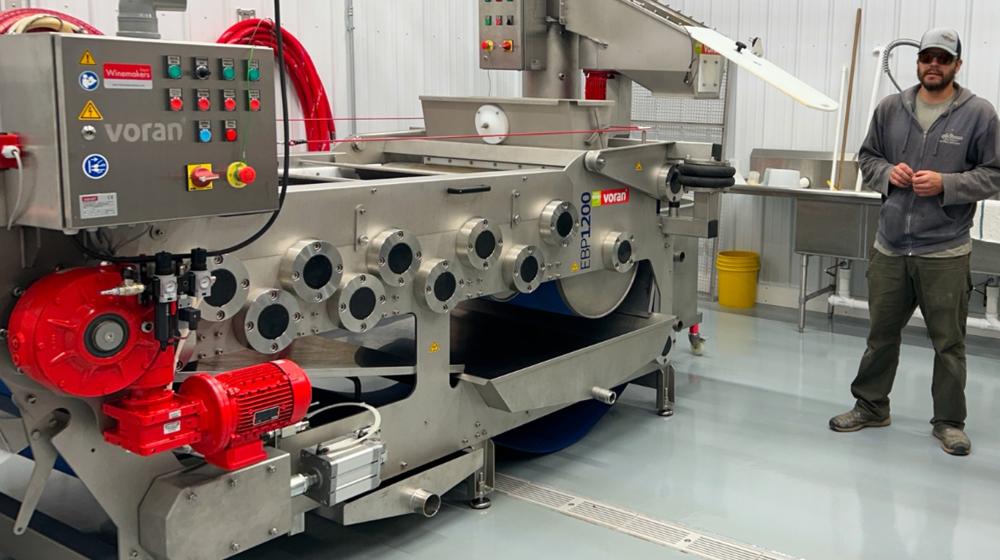 Dane Hauser with apple press