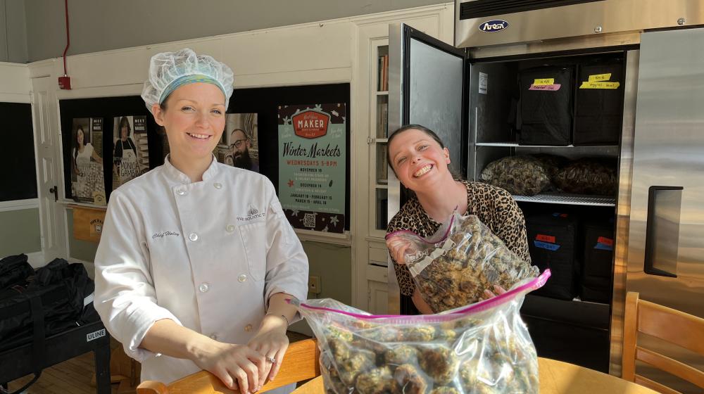 Two women smiling