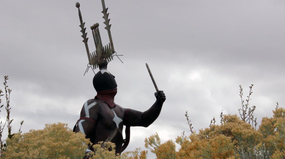 Native American statue on IAIA Campus