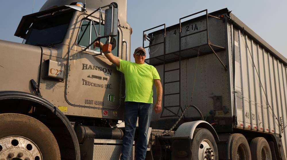 Man in front of truck