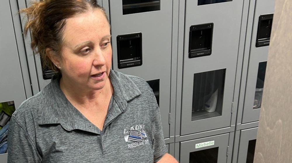 Staff member shows new facility 