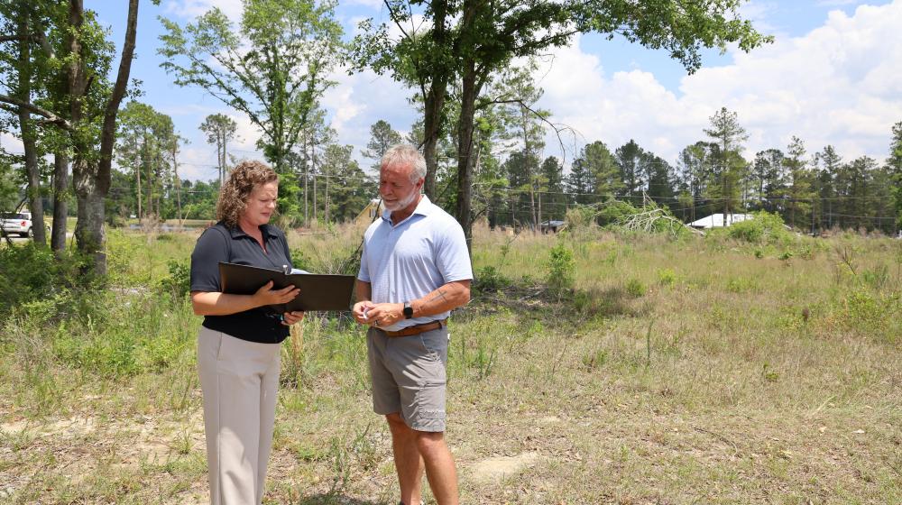 Mayor Bennett and Amy Wilkie review plans