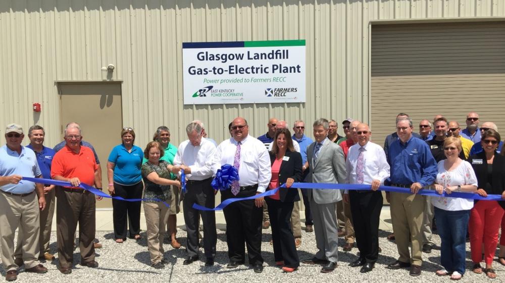 group photo of a ribbon cutting