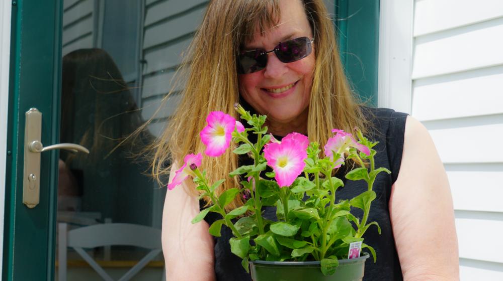 New Homeowner Kate McGowan with flowers