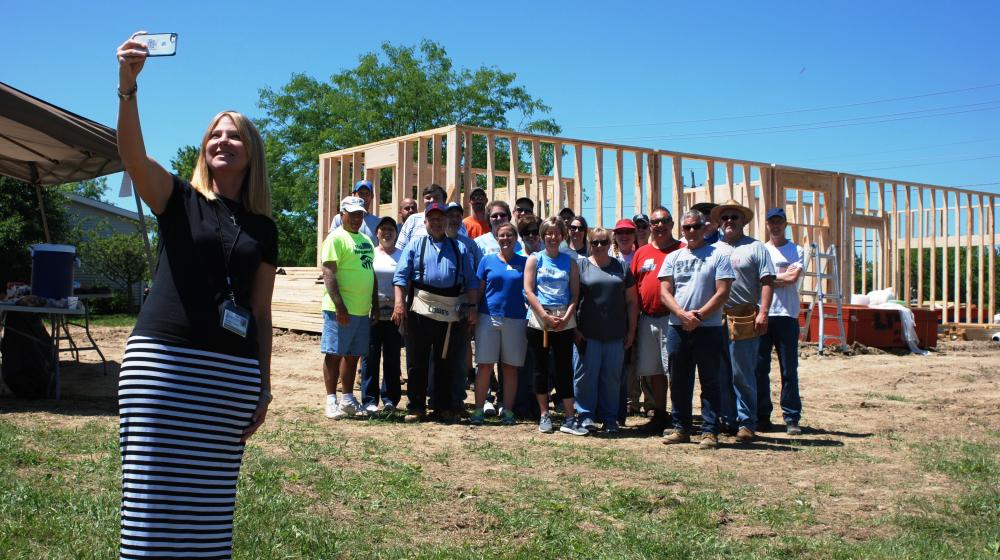 This is a photo of Michelle Amrine with team members from Ohio Rural Development.