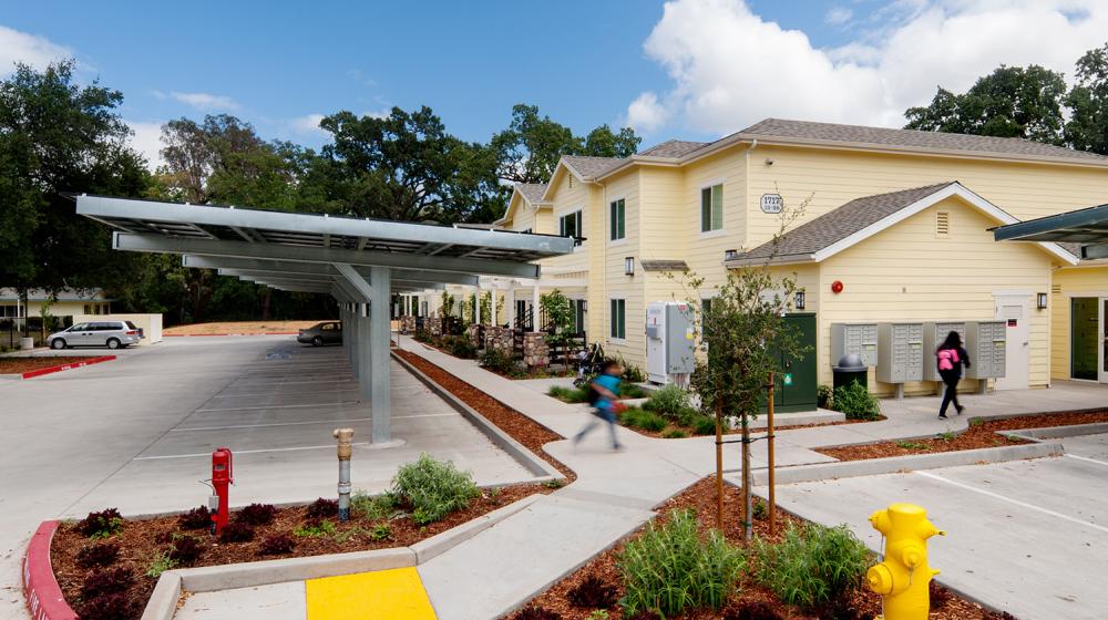 Solar panels and drought-tolerant landscaping at Calistoga Family Apartments, a farm labor housing camp in Calistoga, Calif.