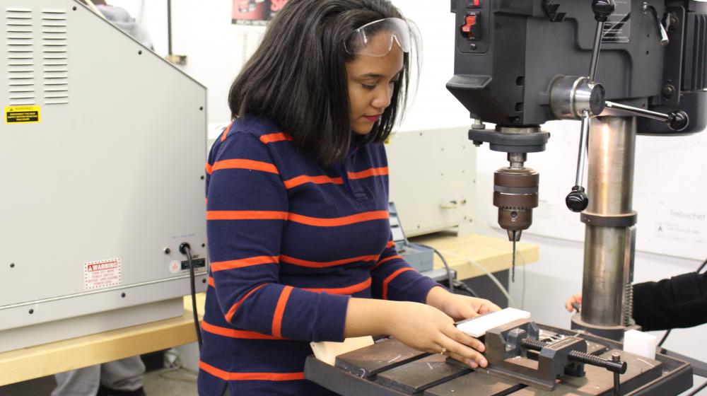 Student manually developing 3D design at Lake Country Advanced Knowledge Center, a process that takes days - or even weeks.