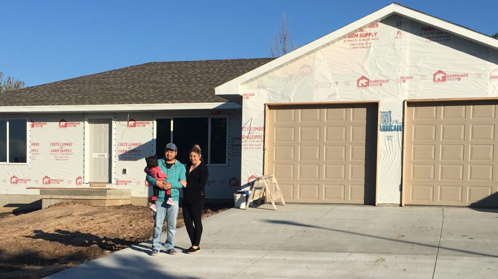 The Echeverria Family outside their new home.
