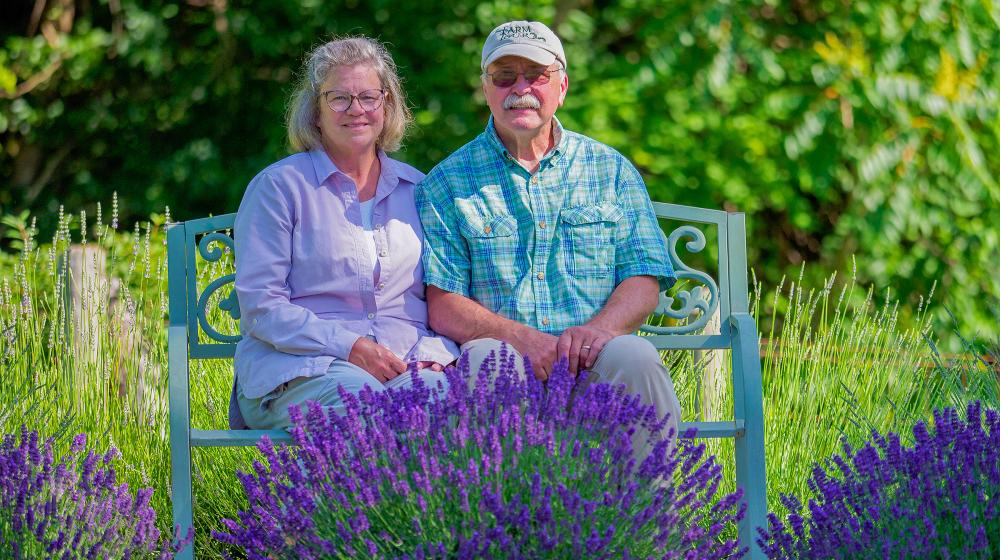 Mary and Neil Seek enjoy a quiet moment in their lavender field.
