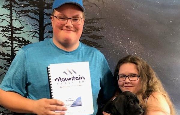 Blue shirt with wife and catdog