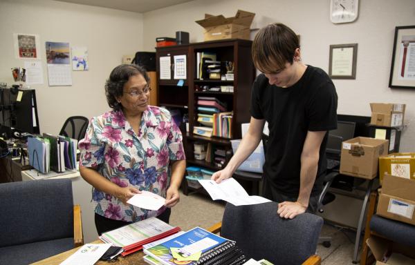 Vinita Domier, Officer Manger for California Center for Cooperative Development, goes over Co-op education material.