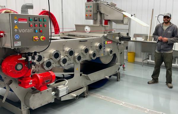 Dane Hauser with apple press