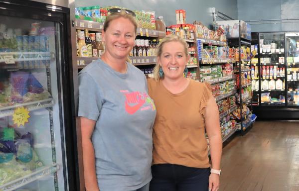 Jen Young and Jessica Heesacker show off the Farm to Family Coop in Hay Springs, Nebraska