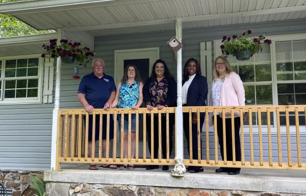 Norris Family pictured with TN RD State Director & Crossville Housing Authority
