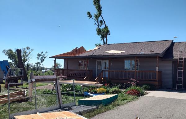 The exterior of Susan Noesen's home following the tornado that struck Alexandria in May of 2022. 