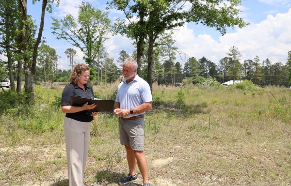 Mayor Bennett and Amy Wilkie review plans