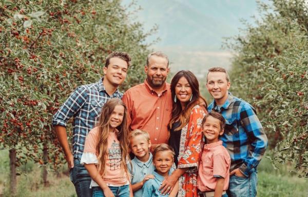 Chris Wall and his family in their cherry orchard