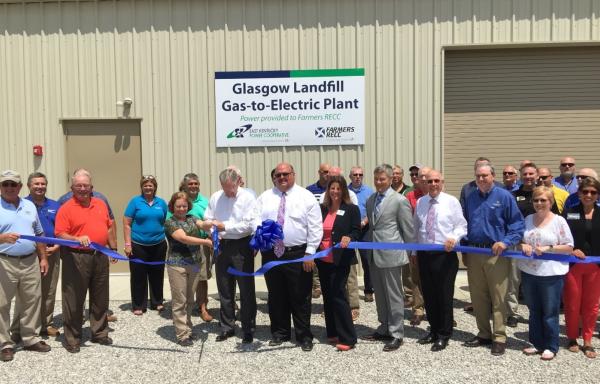 group photo of a ribbon cutting