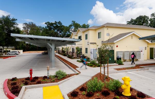 Solar panels and drought-tolerant landscaping at Calistoga Family Apartments, a farm labor housing camp in Calistoga, Calif.