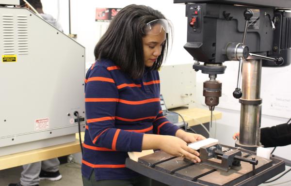 Student manually developing 3D design at Lake Country Advanced Knowledge Center, a process that takes days - or even weeks.