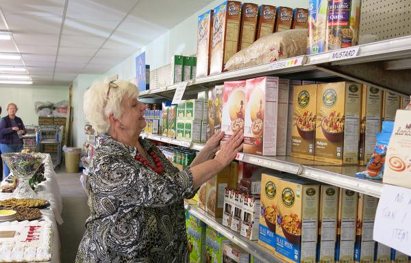 stocking shelves at food pantry