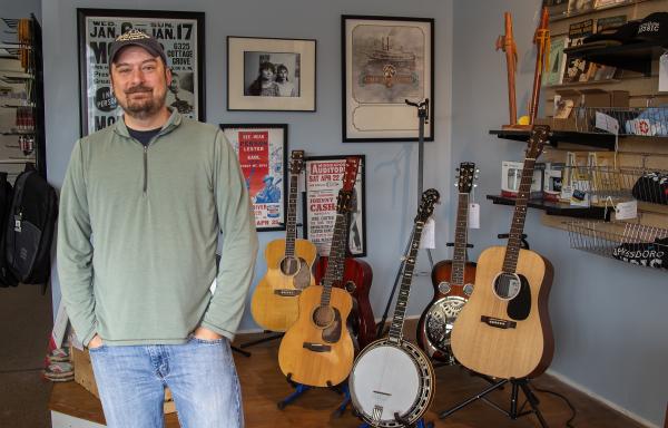 Rob Seal with guitars and a banjo available for sale